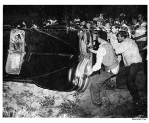 Rioters wreck a car on the night of Aug. 27, when Robeson had originally been scheduled to give a concert in Peekskill.