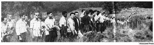 Supporters of Paul Robeson form a defense line in field near Oregon Road before the Sept. 4, 1949 concert.